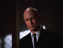 A bald Lex Luthor visiting Rollie Vale