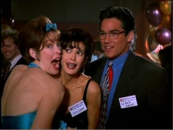 Lois with Clark at high school reunion, hosted by the fiendish Annette Westman