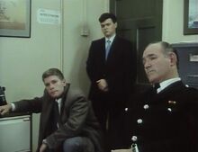 Londons burning DO Thomas and detectives.jpg