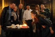 Ola blows out her birthday candles.