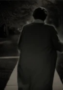 Gromdy at the age of 88 in February 1991, walking down the street of her neighborhood.