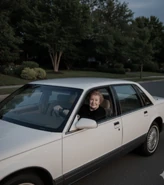 Gromdy driving in her car at the age of 102 in April 2005, while on a visit to her old neighborhood.