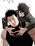 Eli grabbing Darius from behind