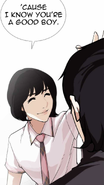 Heather patting Eli on the head