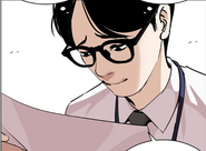 Hyunwoo looking at Darius picture