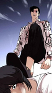 Gun looking at Eli