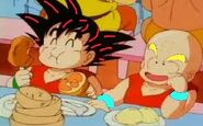 Kid krillin and kid goku eating