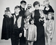 Bob with his wife Sody and their children holding puppets of the characters that Clampett had created.