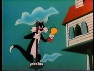 Sylvester grabs Tweety before bouncing away