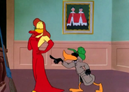 Daffy continues questioning Shapely Lady Duck.