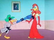 Shocked that Daffy handed her a pistol