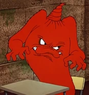 Gossamer with his hair twisted.