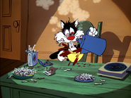 Sylvester chain-smoking and downing two cups of coffee which is cut in most TV broadcasts in America