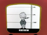 "Have you seen this man? He is Ant Hill Harry, alias Babyface Finster. Notorious bank robber believed to have perpetrated the daring Last National Bank holdup this morning."