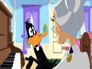 Teaching piano to Daffy.