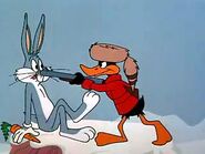 Daffy threatening Bugs that he is going to kill the rabbit for his fur coat