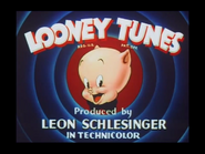 1943-1944 Looney Tunes Blue Rings Red Background Porky Pig's Head