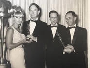 Chuck at the 38th Academy Awards with Elke Sommer (left), Les Goldman (far right), and Don Knotts (between Chuck and Les)