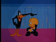 Daffy ordering Elmer