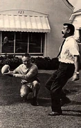 Bill playing football with Charles Schulz
