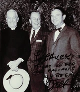 Chuck (right) with Walt Disney (middle)