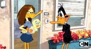 Tina, ticked off by Daffy