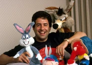 Jeff with dolls of Looney Tunes characters