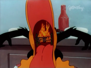 A fireplace visible in Daffy's throat after eating spicy Mexican cuisine.