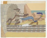 Production background with a Road Runner and Wile E. Coyote cel