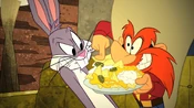 The Fish and Visitors (876 KB) Yosemite Sam offers Bugs some nachos.