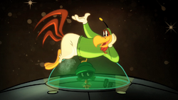 Marvin is seen in a UFO with  lying on it.