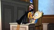 Daffy thinks Porky is lying in the courtroom.