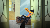 Daffy starts to laugh when he invites the neighbors.