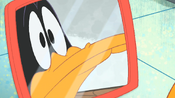 Daffy sees a bump on his beak.