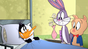 Daffy looks to Bugs and Porky for help.