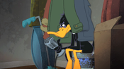 Daffy, while hiding in the closet, announces one of them as a "thief".