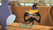 Bugs and Daffy ordered ribs, while Porky ordered a salad.
