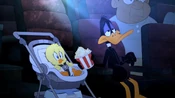 Daffy and Zachary at a movie that Zachary doesn't want to see.