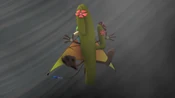 The tornado sucks up a cactus in its path.