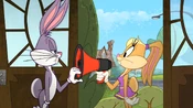Bugs pushes the megaphone away from Lola's mouth.