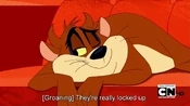 Taz enjoys Daffy's pain.
