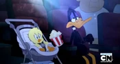 Daffy watching a war movie with Tina's nephew, Zachary.