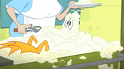 Daffy gets thrown into cream.