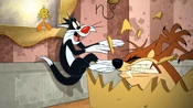 Taz eats the table to find a scared Sylvester and Tweety.