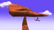 ...which lies atop another boulder.