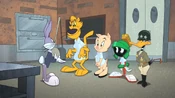Waiter Bugs tells Porky, Daffy, Pete and Marvin about...