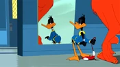 Daffy checking himself out in a mirror.
