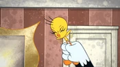 Tweety starts to fly with Sylvester hanging onto his feet.