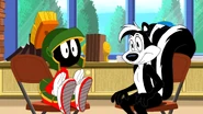 Marvin and Pepe Le Pew.