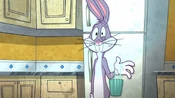 Bugs gets twitchy and drops his coffee when Daffy reveals he forgot to pay the newspaper bill.
